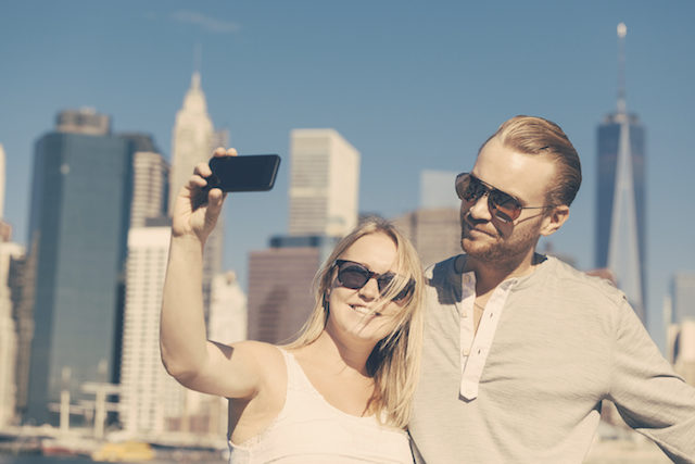 Caucasian Couple Taking Selfie in New York